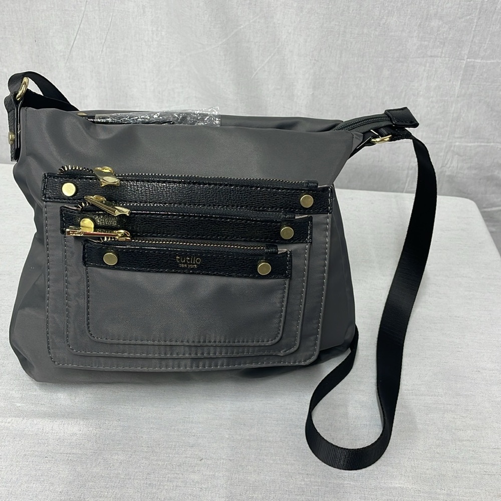 Tutilo New York crossbody purse, gray nylon fabric with PVC trim. NWOT
